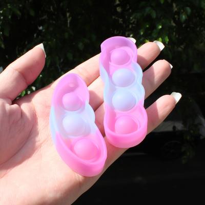 China DD322 Amazone Key Chain Mini Soft Keyring Stress Reliever Children's Popular Luminous Beans Toy Key Ring Pendant Fidget for sale