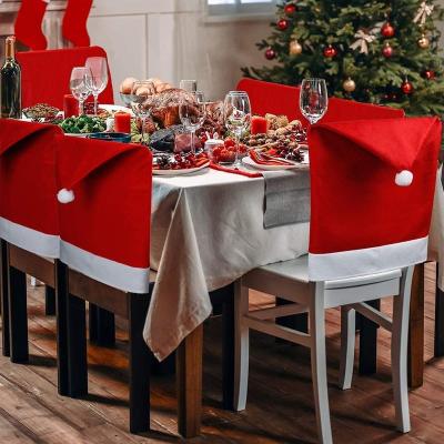 China Christmas Chair Covers for Dining Room Table Decoration Santa Hat Chair Back Cover for Christmas Restaurant Holiday Festival Party Decor for sale