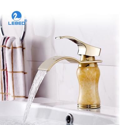 China Metered Faucets Black Gold Plated Single Handle Basin Faucet Jade With Hot And Cold Bathroom Faucet for sale