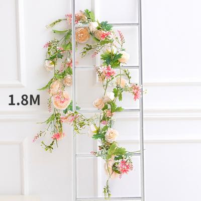 China Durable Factory wedding decoration wicker covering simulation plant wall rose artificial rattan for sale