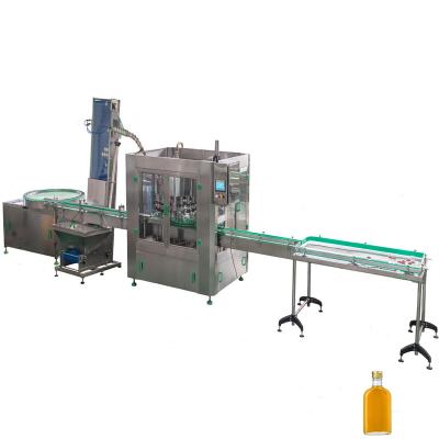 China Food for sale automatic liquor bottle filling machine peristaltic liquid filling machine price 9000-11000 bph for sale