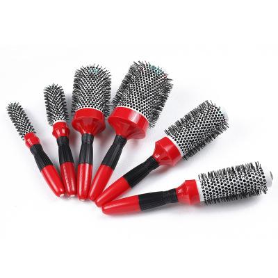 China Promotion Round Rubber Handle Massage Hair Brush Air Heat Conduction Roller Ceramic Fluffy Comb for sale