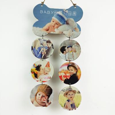 China Modern Popular Custom Baby Print Printing Press Amazon Images Sublimation Blank Wood Hanger for Baby's First Birthday for sale