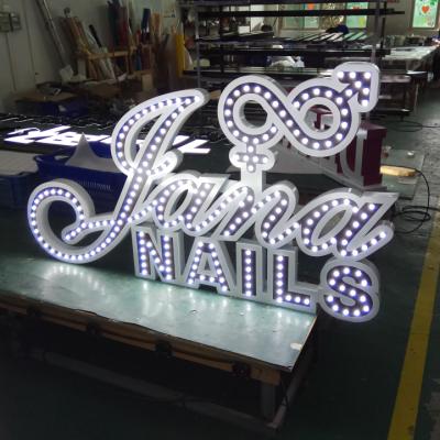 China Free Standing Custom Buildings Logo Stainless Steel Dot Light Letter Sign for sale