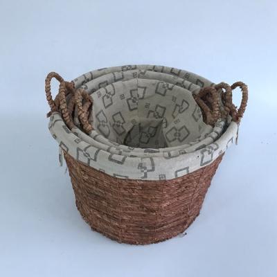 China Sustainable Unique Extra Large Round Shaped Plant Plankton Straw Corn Husk Storage Toy Woven Laundry Basket With Fabric Lining for sale