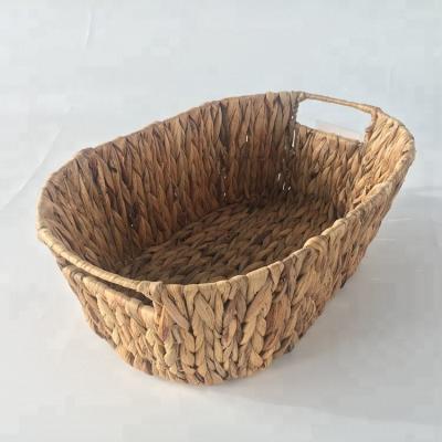 China Cheap Sustainable Oval Woven Sweater Weave Basket Water Hyacinth Basket for sale