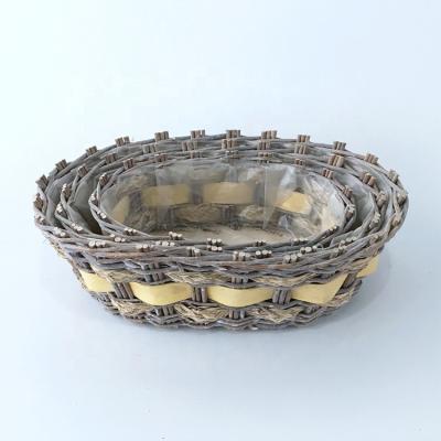 China Cheap China Amazon Top 10 Round Willow Display Basket Set With Plastic Lining Storage Basket Set Fashionable Wicker Dish For Flower for sale