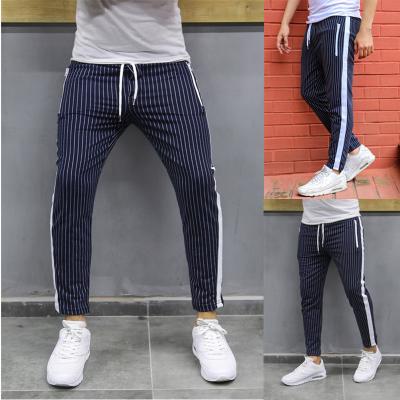 China QUICK DRY casual pants European and American fashion fitness pants running men's track pants casual sports sweatpants drawstring for sale