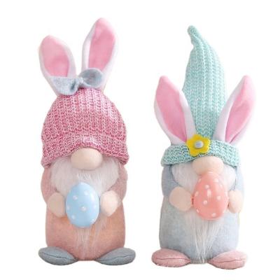 China Decoration New Easter Home Decor With Lights Glowing Faceless Old Man Doll Rabbit Ears Holding Eggs Dwarf Doll Ornaments for sale