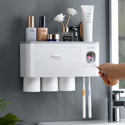 China Single Toothpaste Dispenser Holder Single Toothbrush Holder Bathroom Accessories Wall Mounted Toothbrush Holder Three Cups for sale