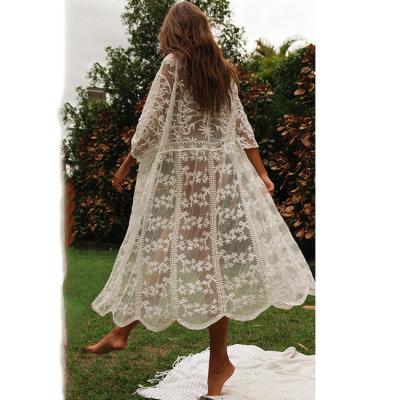 China Anti-UV beach kaftan wear for woman hollow out extra long crochet lace dress summer dress with long sleeves for sale