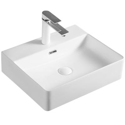 China Easy Clean Durable Sanitary Ware Bathroom Wash Basin White Ceramic Above Counter Basin Rectangular Glossy Wash Downs For Hotel for sale