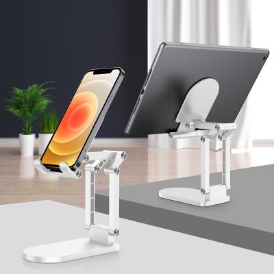 China Adjustable Portable Folding Universal Holder Mobile Phone Stander Adjustable Tablets Notebook Desk Stand Plastic Support for sale