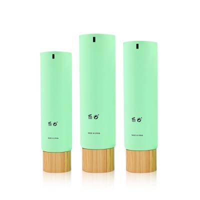 China 10 20 30 50 100 150 200 ml plastic cosmetic refillable bamboo lid hand cream tube container pp tubes plastic cosmetic packaging for sale