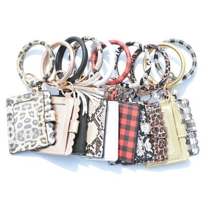 China Customized Customized 2020 Leopard Leather Wristband PU Leather Tassel Credit Card Wallet Key Chain Key Chain for sale