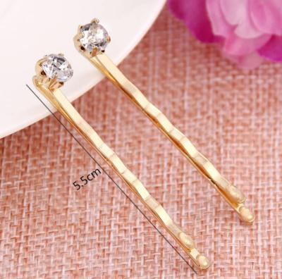 China Sweet Word Gold Hair Clip Custom Rhinestone Simple Hair Accessories Alloy Hair Clip for sale