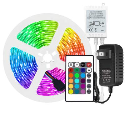 China Remote Controlled LANDSCAPE IP20 24key IR 5050 5M 150LED 12V RGB LED Strip With Power Adapter for sale