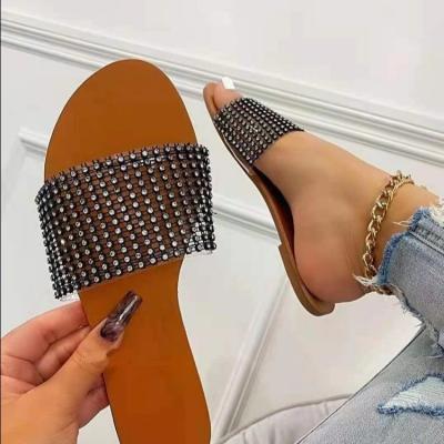 China New fashion trend shoes women's flat slippers summer diamond round flat bottom beach sandals transparent outdoor women's vacation for sale