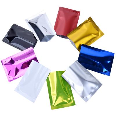 China Disposable multicolor shiny glossy printing foil metalzied 3 sides sealing plastic food bags with tear notch for sale