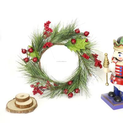 China Christmas Decor Greenery Berry Wreaths Artificial Pine Needle PVC Garland with Leaves Circle Plastic Wire Braid Hanging Ornament for sale