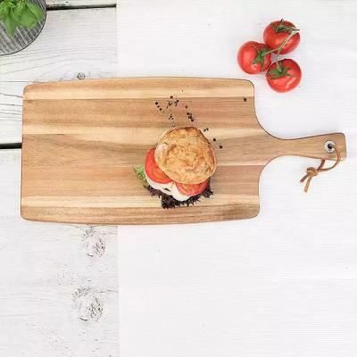 China Manufacturers Viable Premium High Standard Long Handle Wood Cutting Round Type Butcher Block For Home Cutting Board Rectangle Decor for sale