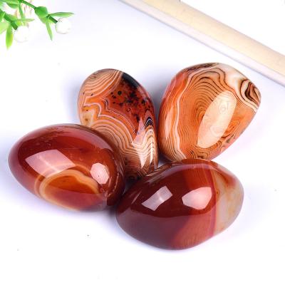 China Luck Madagascar Carnelian China Crystal Agate Sardonyx Irregular Oval Banded Red Agate for sale