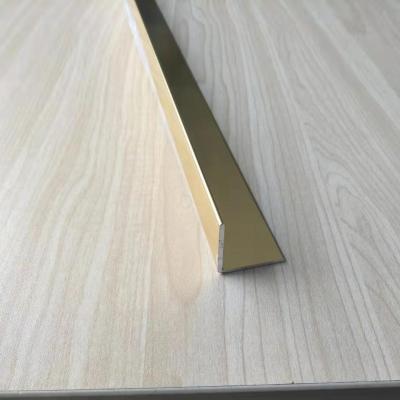 China Custom Made Fireproof L Shaped Aluminum Corner Trim Brass Gold Trim Metal Strip Tile Edge Trim For Protection for sale