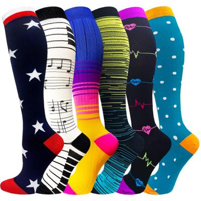 China Breathable men's and women's compression socks, color fashion, European and American personality in the tube printing long socks for sale