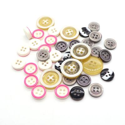 China Viable Custom Logo Plastic Resin Two Color Buttons Blouse Shirt Khaki Button Up Buttons For Kids for sale