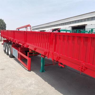 China Medium And Long Distance Heavy Bulk Cargo Transport Sinotruk Cheap 40 Tons Wooden Pile Selling Barrier Semi Trailer for sale