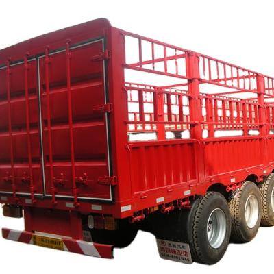 China Medium and long distance goooseneck barrier semi trailer side wall stake side barrier heavy bulk trailer side wall barrier semi trailer for sale