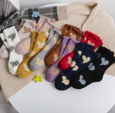 China Japanese Cute Sustainable Plush Fuzzy Warm Winter Floor Socks Comfortable Warm Thermal Socks With Gold Heart Pattern for sale