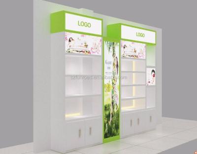 China Shopping mall or retail store with mall glass kiosk cosmetic shelves shop display cabinet interior design for makeup shop counter design for sale