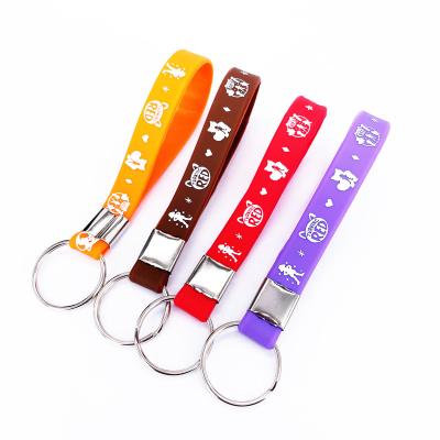 China Events Custom 12mm Debossed / Engraved Key Chain Rubber Keychain / Silicone Embossed Printing Silicone Wristband Basketball Wristband for sale