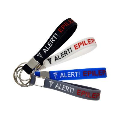 China Custom Events 12mm Silicone Rubber Wristband Ink Injected Key Chain Sports Basketball Wristband Silicon Rubber Wristband Keychain for sale