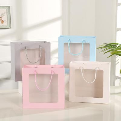 China Wholesale Recyclable Transparent White Ivory Panel Gift Bag Paper Window Lipack Packaging Paper Bag With Clear Window for sale