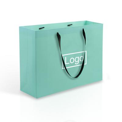 China Recyclable Boutique Green Custom Logo Printed Cosmetic Shopping Bags Tyvek Paper Bag Lipack for sale