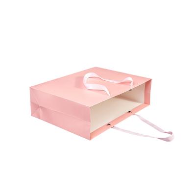 China Lipack recyclable paper bag ready to ship pink paper bag printed with logo for sale