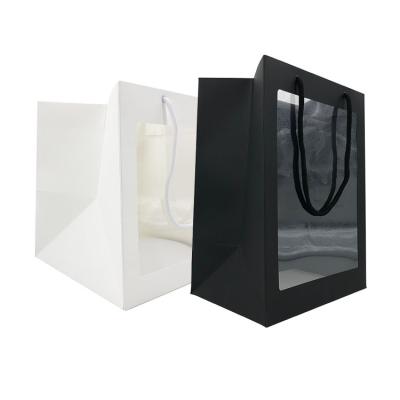 China 100pcs MOQ Hot Sale Recyclable Luxury Black And White Color Clear Window Paper Flower Gift Bag For Europe for sale