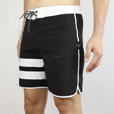 China 2021 QUICK DRY Logo Summer Surf Board Swim Custom Made Colorful Hot Shorts Black White Beach Shorts Men's Boardshorts for sale