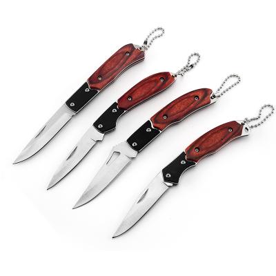 China Color Tactical Wooden Handle Small Outdoor Camping Pocket Knife With Key Chain for sale