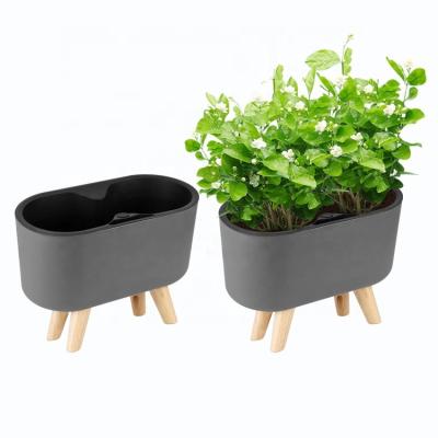 China Hot Selling Minimalist New Product With Dark Gray Wooden Bracket Round Double Hole Oval Without Water Level Indicator Plastic Flower Pots for sale