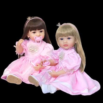 China 55CM Original Bebe Doll Reborn Toddler Girl Princess Doll In Pink Full Body Soft Silicone Dress Two Hair Color Bath Toy for sale