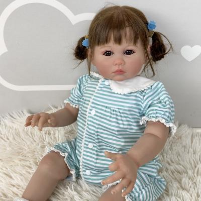 China Julieata 24inch Soft Reborn Toddler Girl Soft Cloth Body Rooted Hair 3D Doll High Quality Hand Painted Skin for sale