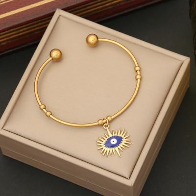 China Fashion Stainless Steel Eye Charm Cuff Bracelet Gold Devil'S Eye Cuff Bracelet With Evil Eye Pendant for sale