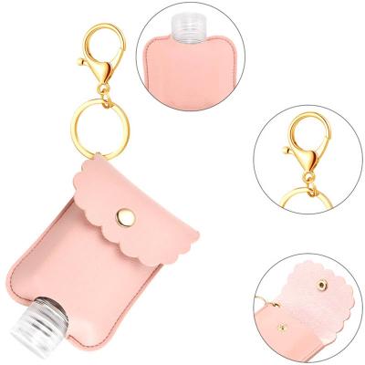 China Amazon Eco-Friendly Hot Sale Hand Sanitizer Holder Portable Key Chained Empty Hand Sanitizer Bottle With Key Chain for sale