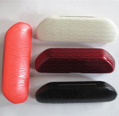 China Fashionable glasses cases with solid colored leather for sale