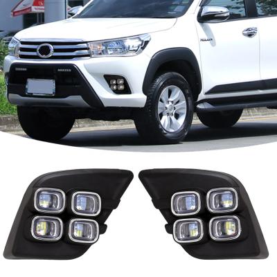 China ABS+LED Car Turn Signal Headlights Fog Lamps LED DRL Daytime Running Lights For Toyota Hilux Revo 2015-2016 for sale