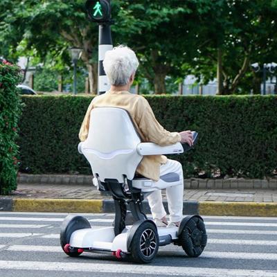 China Titanium-aluminum alloy lightweight electric adult older mobility scooter for elders and disabled adult automatic folding portable mobility scooter for sale