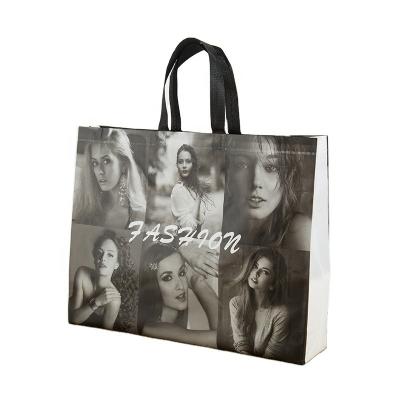 China Waterproof Custom Printed Logo Gift Bag Shopping Handle Cloth pp Nonwoven Folding Nonwoven Bag For Garment for sale